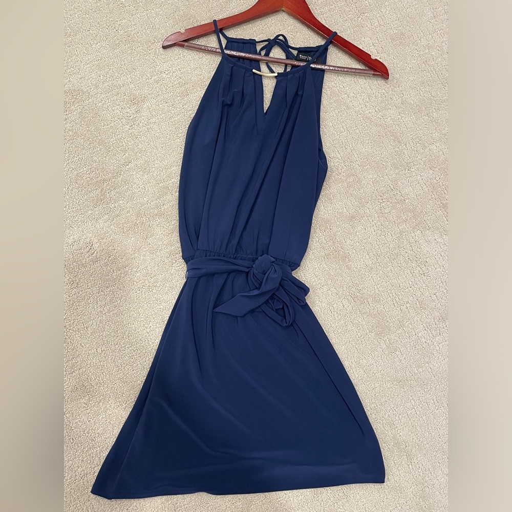 White House Black Market halter cocktail dress with gold neck detail.